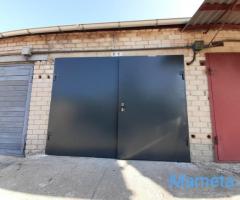 Metaliniai garažo vartai, durys.